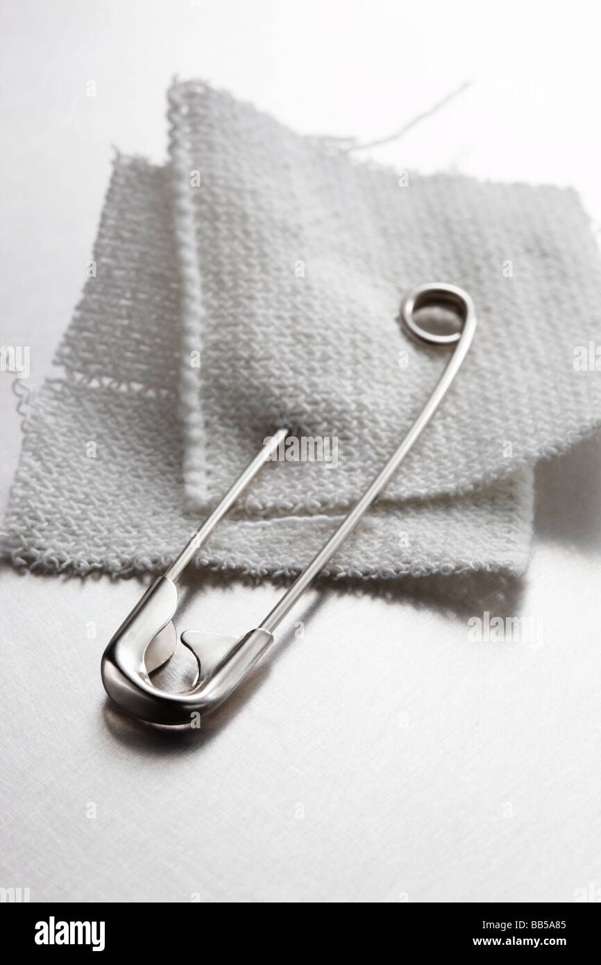 Safety pin detail hi-res stock photography and images - Alamy