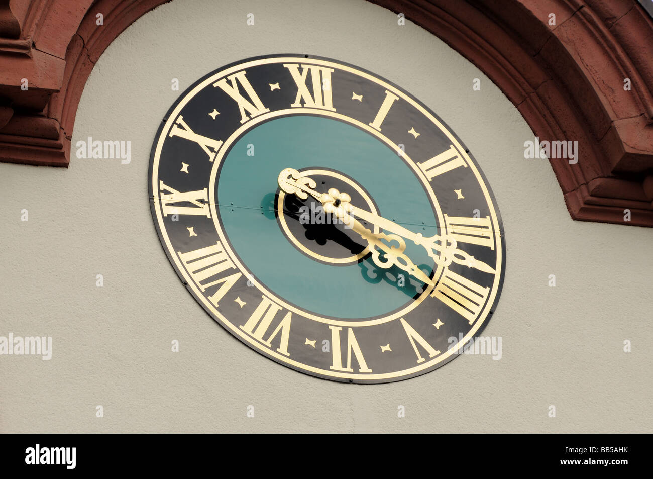 Old clock on the tower in Schwetzingen, Germany Stock Photo