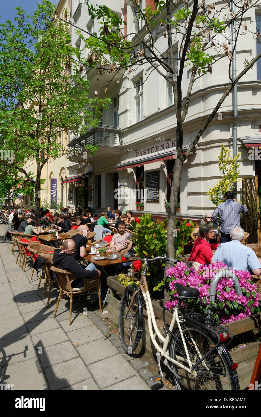 Berlin Germany People enjoy brunch outdoors at the Pasternak Cafe in Prenzlauer Berg Stock Photo