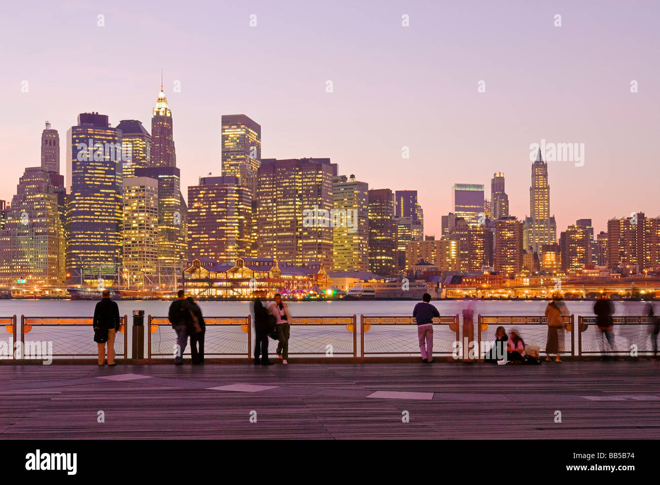People enjoying view of Lower Manhattan skyline, New York City. Stock Photo