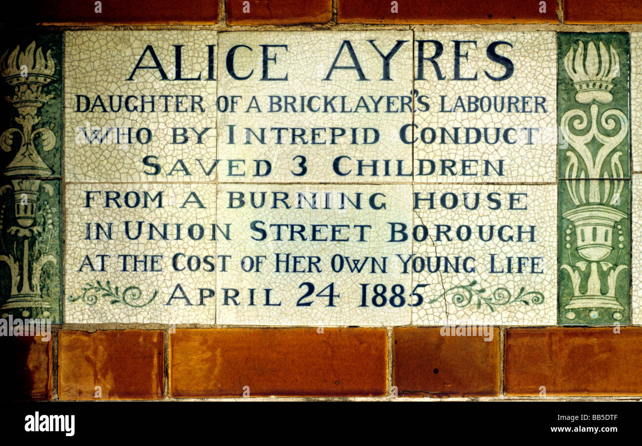 Heroic Deeds Postman's Park London Alice Ayres ceramic tablet tablets tile tiles hand painted Royal Doulton by GF Watts England Stock Photo
