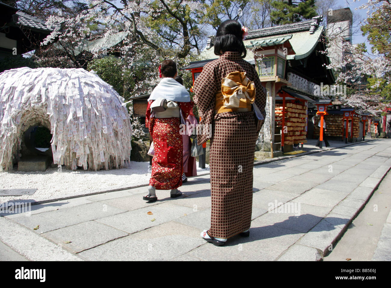 Women dressed as Geisha wearing Kimono at a temple in Kyoto, Japan. Stock Photo