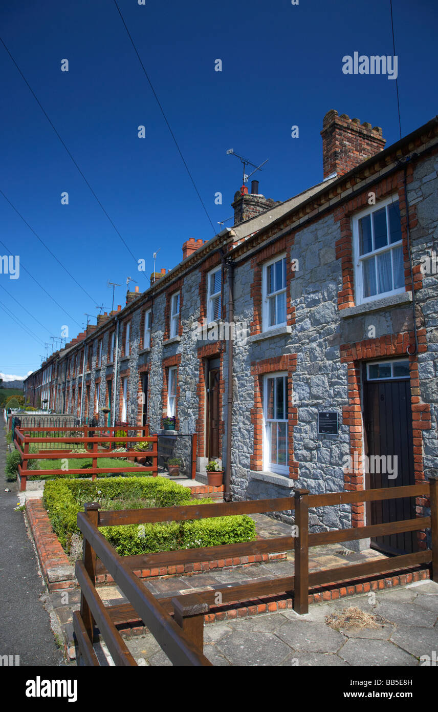 row of granite mill houses on college square east in bessbrook model village county armagh Stock Photo