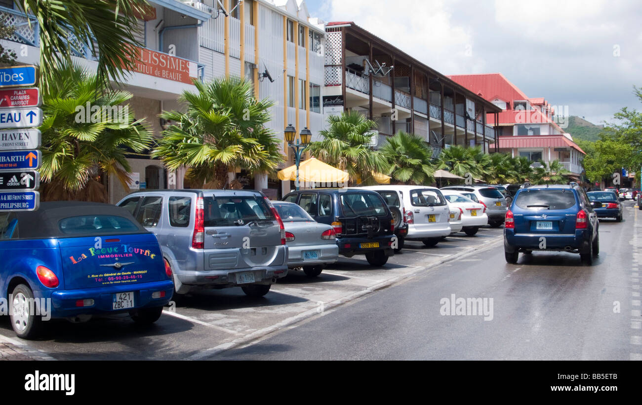 Street view shops parked cars Marigot French Saint Martin Stock Photo