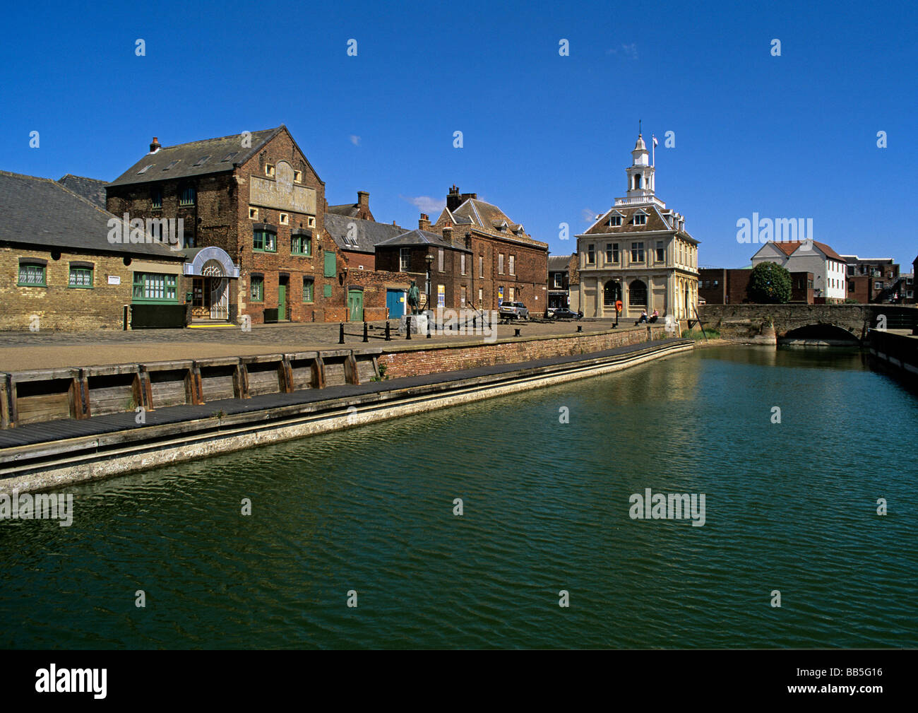 refurbished wet dock and quayside towards the Old Customs house and old warehouses of Kings Lynn