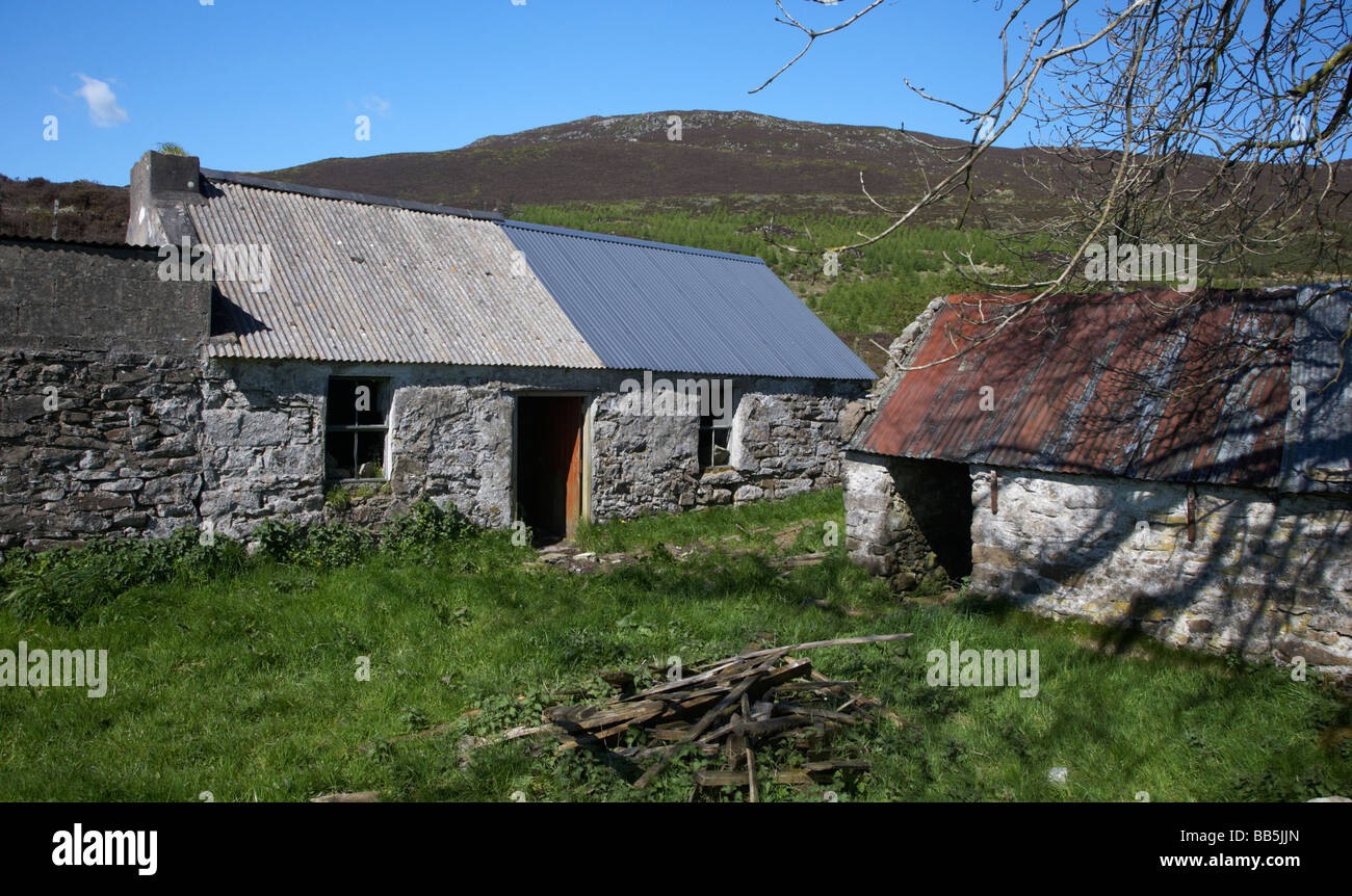 old abandoned remote rural irish farm buildings on Slieve Gullion mountain in the ring of gullion south county armagh Stock Photo