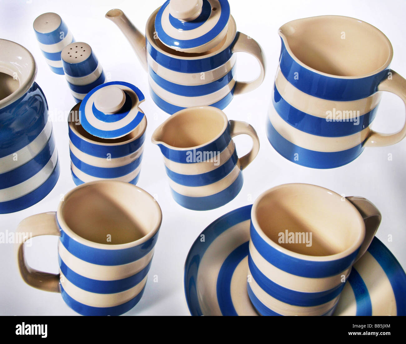 Blue and white crockery jumping about Stock Photo Alamy