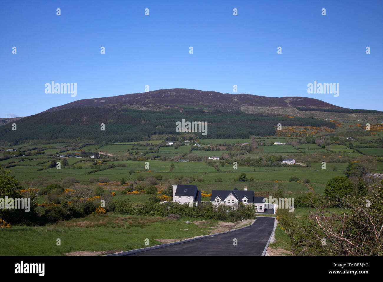 brand new newbuild large home in countryside beneath Slieve Gullion mountain in the ring of gullion south county armagh Stock Photo
