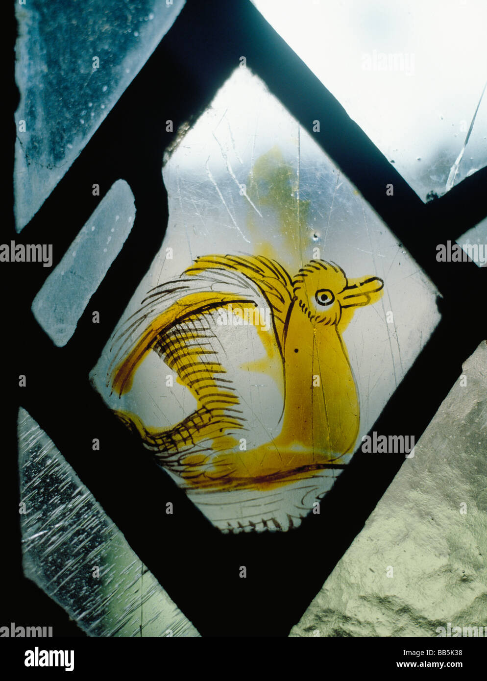 Durham Cathedral Chapter House medieval stained glass with yellow bird Stock Photo
