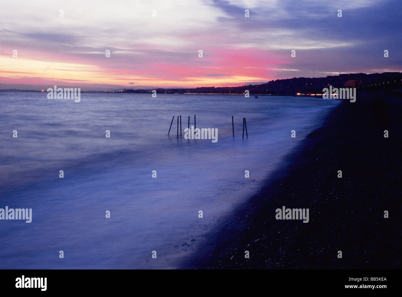 Sunset on the beach in Nice Stock Photo