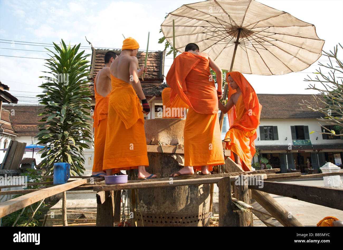 Buddhist monks drumming routine on a large drum at their temple in ...