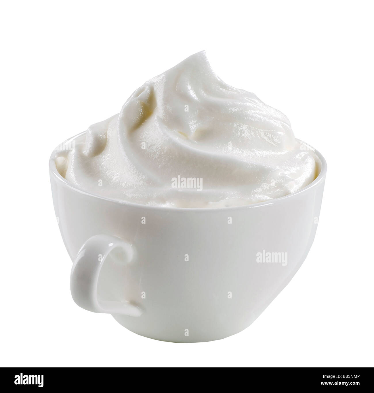 Swirl of whipped cream in a cup Stock Photo