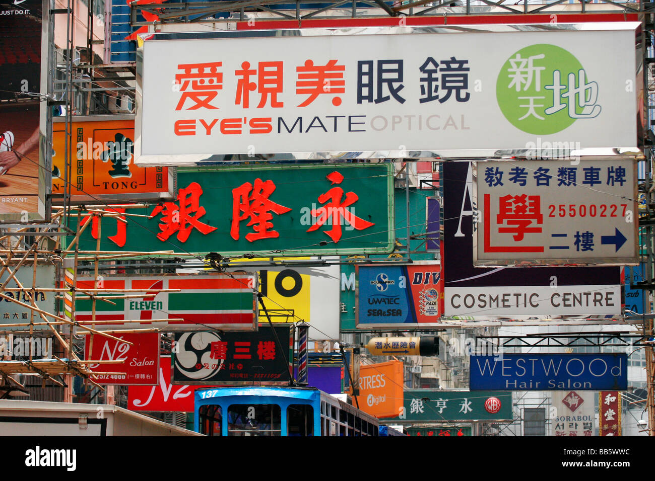 A Hong Kong street displays various signs and signage for the different