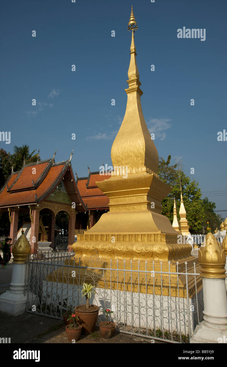 A stupa at Wat Saen Buddhist temple in Luang Prabang Laos Stock Photo