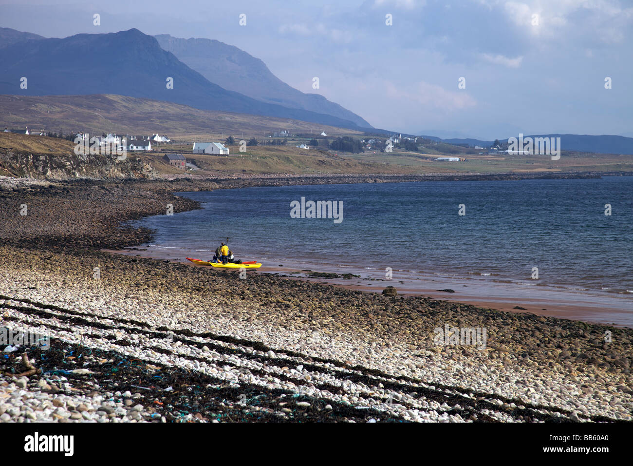 Canoers at Achiltibuie, North west highlands of Scotland, on a sunny day in April Stock Photo