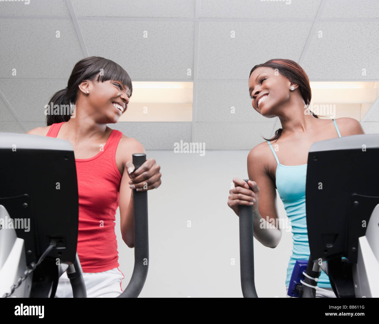 African women using exercise equipment in health club Stock Photo Alamy