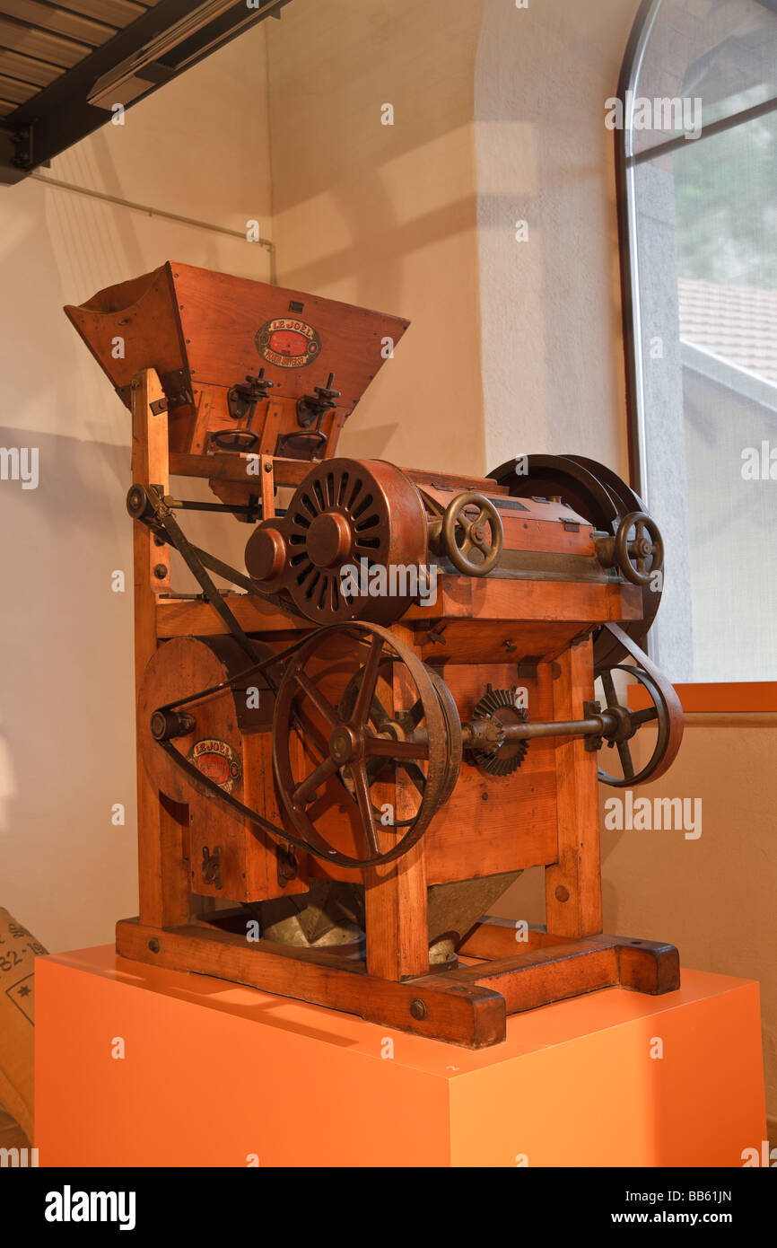 An antique grain grinding machine at Moulins souterrains du Col des Roches Le Locle Switzerland Europe Stock Photo