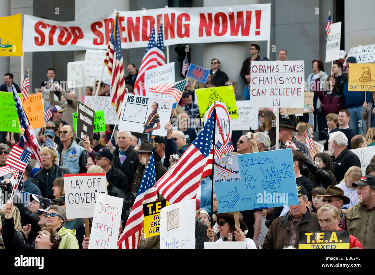 A group of people rally together for a Tea Party on the steps of the