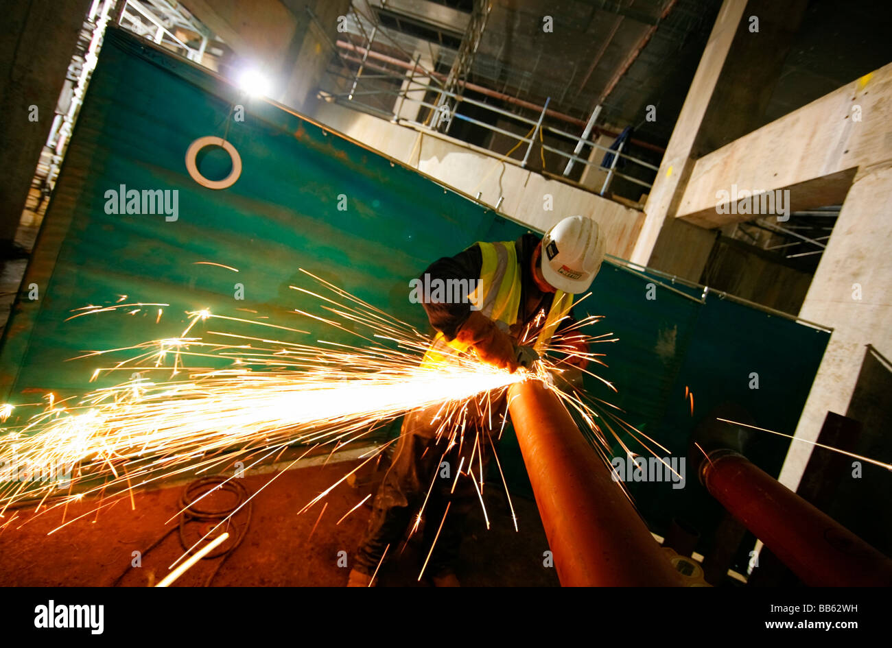 Construction worker welding. Stock Photo