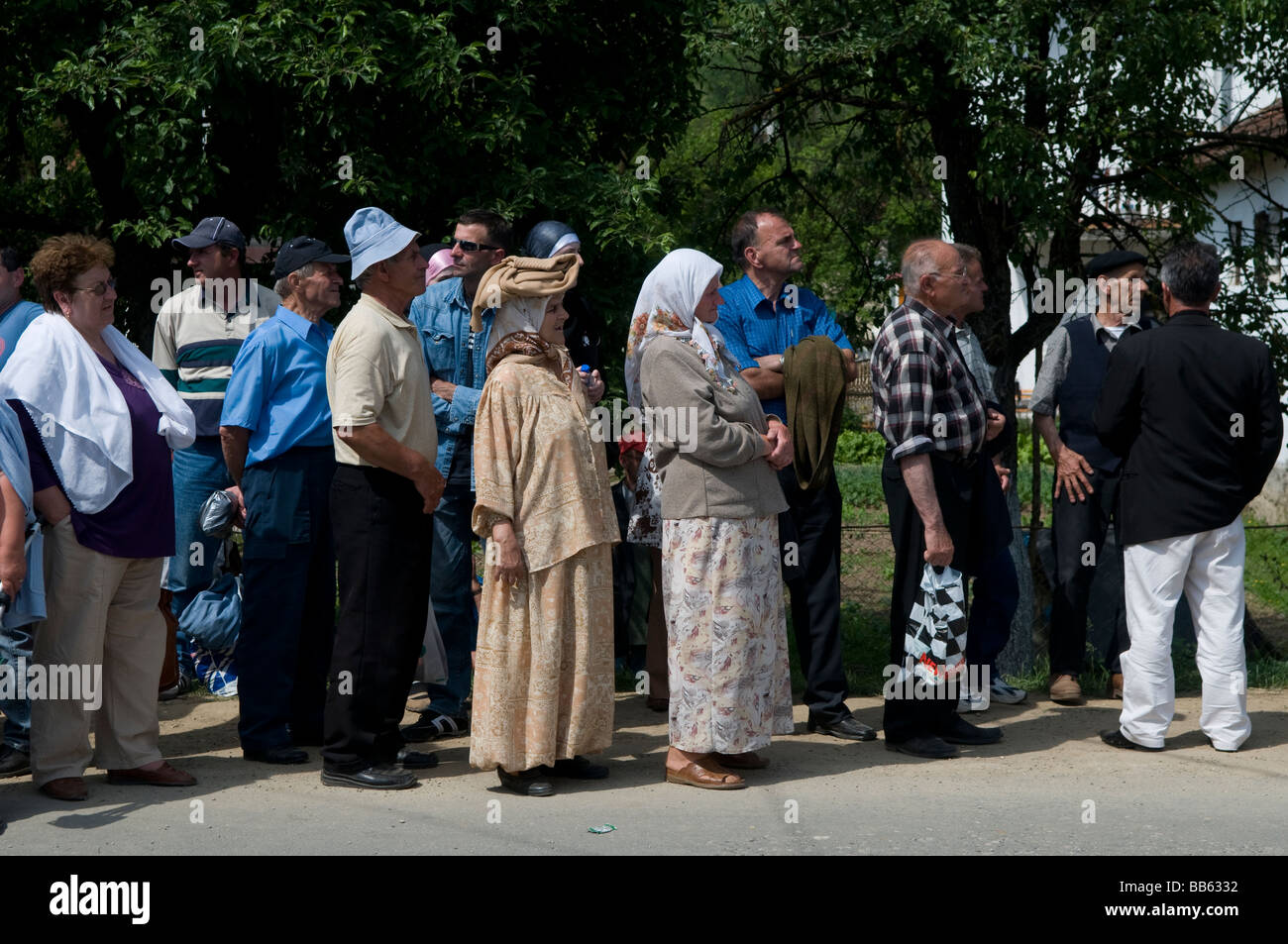 Muslim Bosniaks or Bosniacs going to a reburial of victims of the Srebrenica massacre in Republika Srpska an entity of Bosnia and Herzegovina Stock Photo