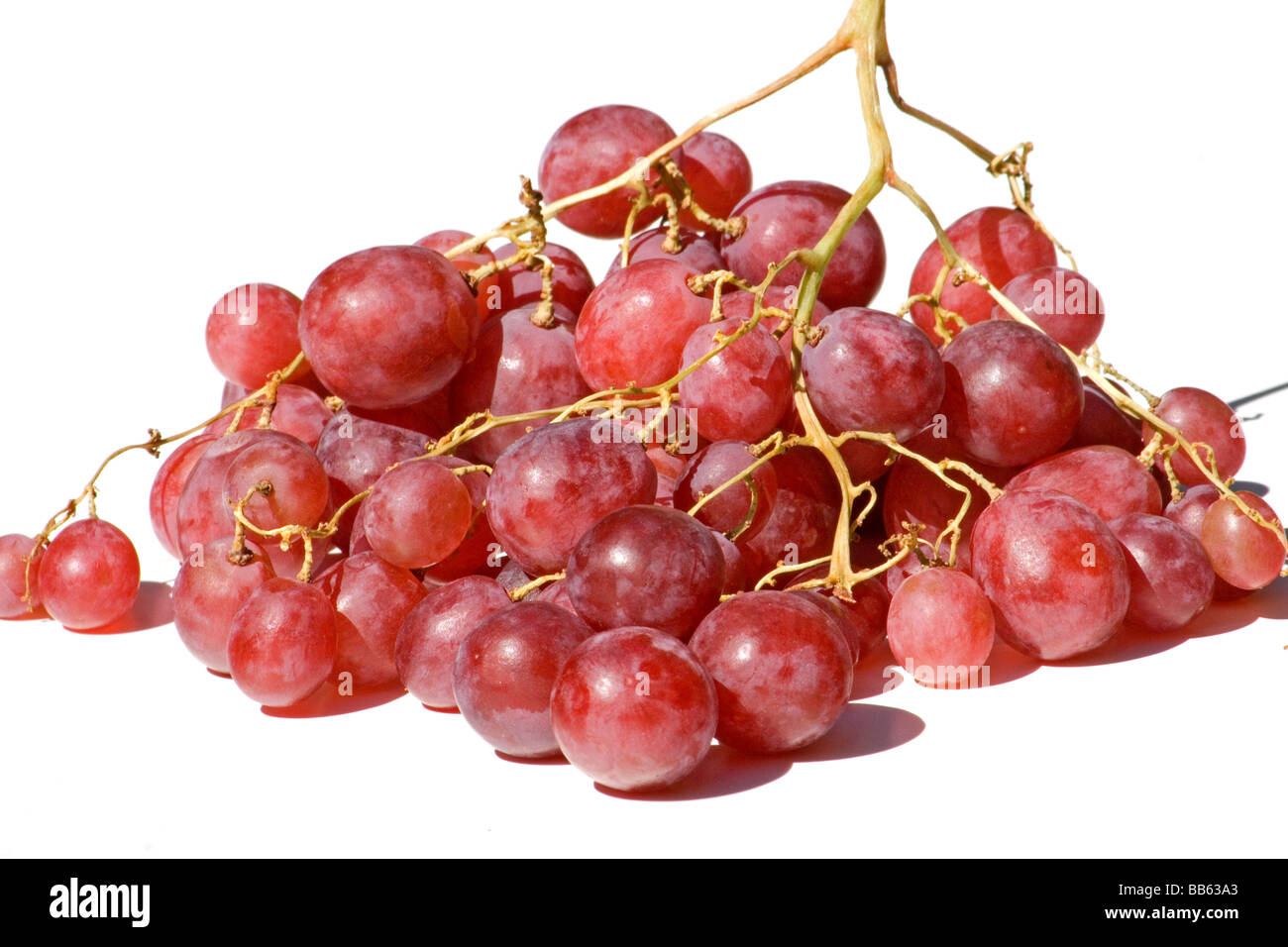 Red grapes on white background Stock Photo