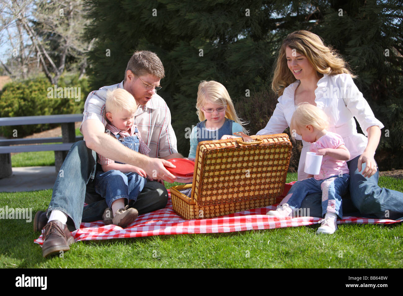 Family having a picnic at the park Stock Photo