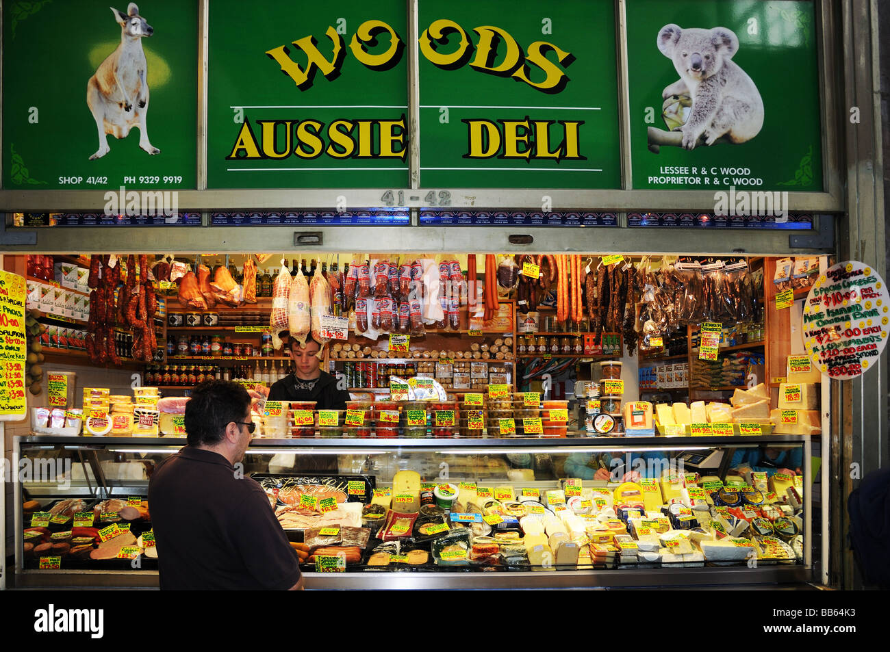 Wood s Aussie Deli selling cheese salami meats and delicatessan Queen Victoria s Market Melbourne Australia Stock Photo