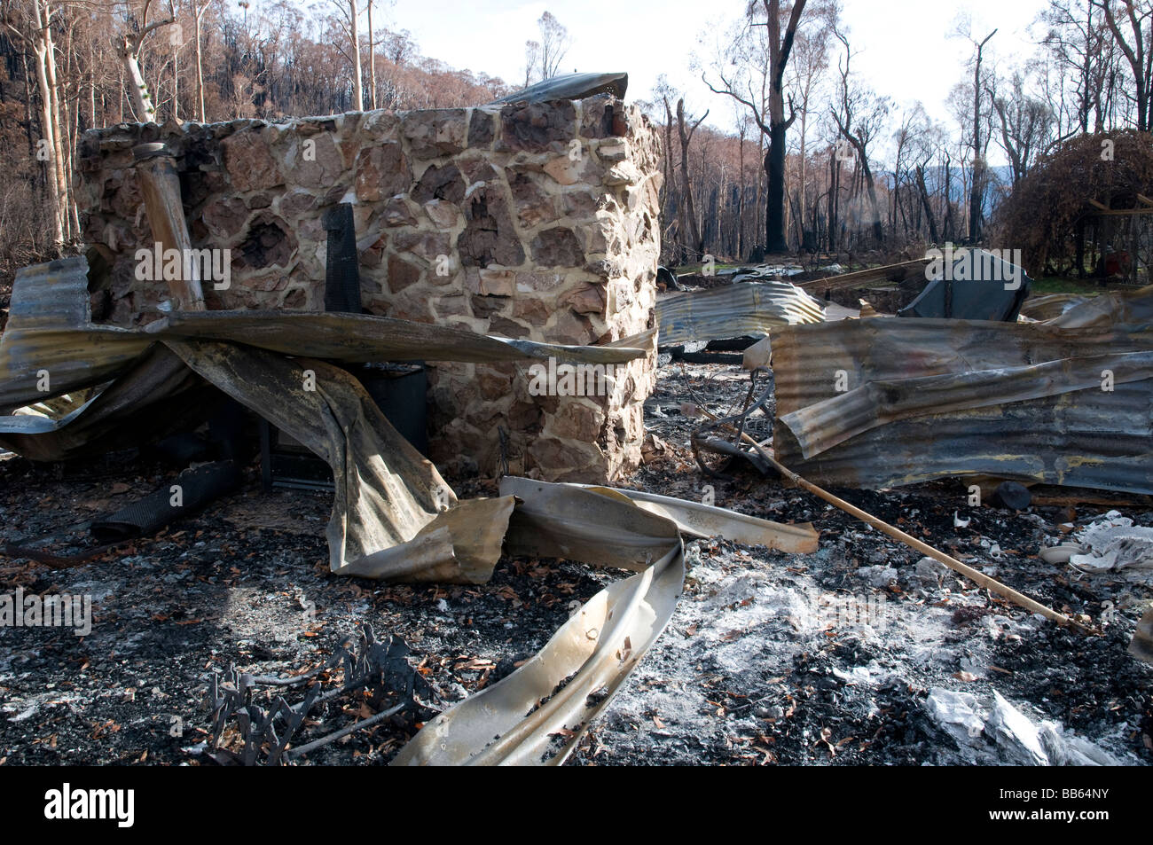 The remains of a home and devastation left after a bushfire Stock Photo ...