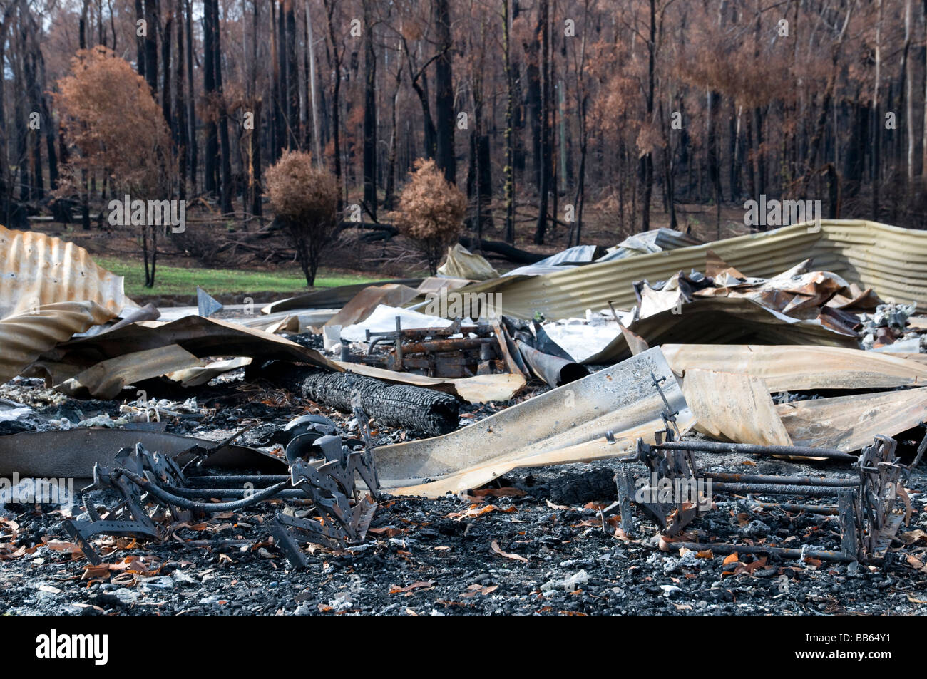 The remains of a home and devastation left after a bushfire Stock Photo ...