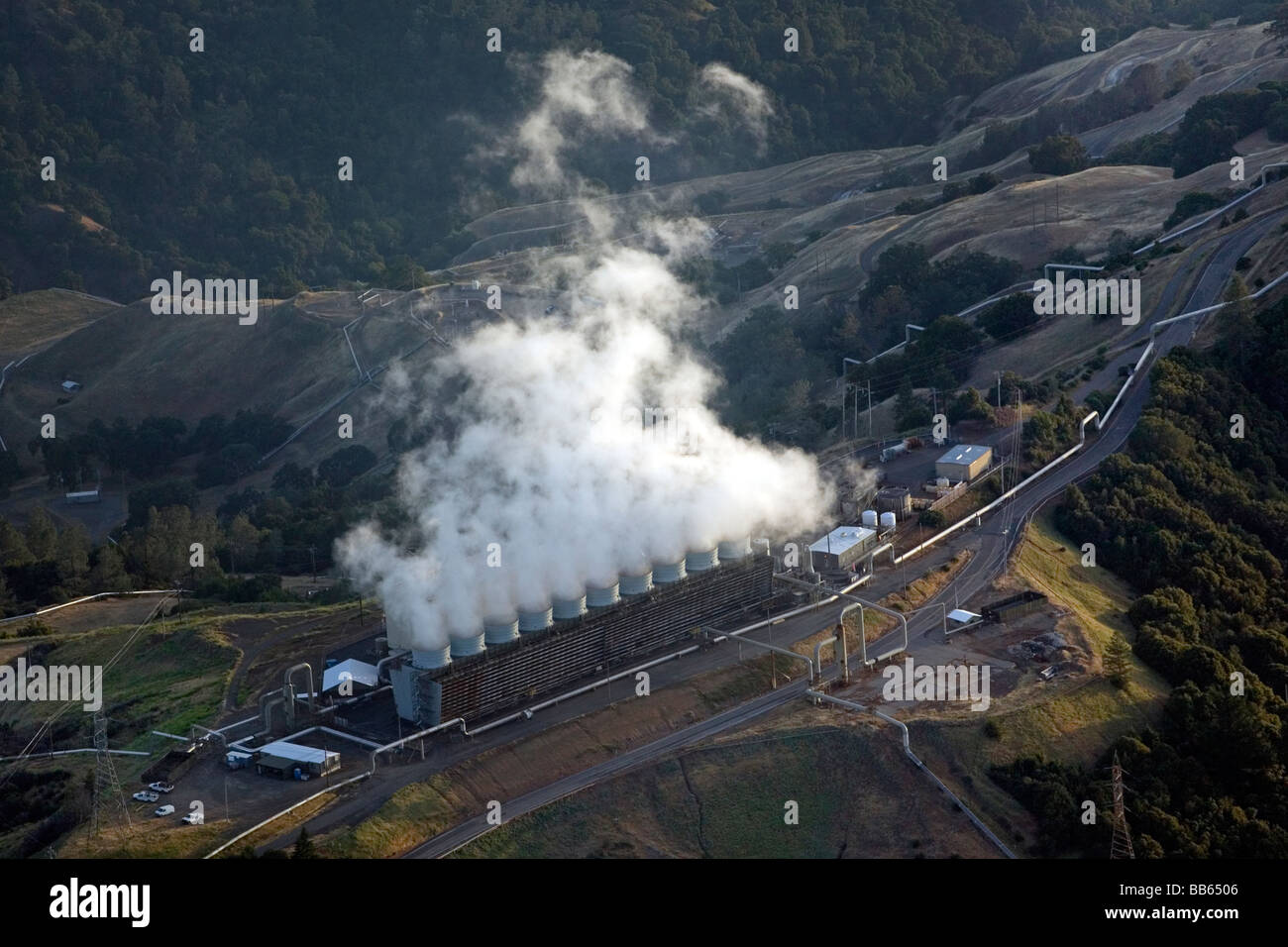 aerial above The Geysers largest group of geothermal power plants in the world northern California Stock Photo
