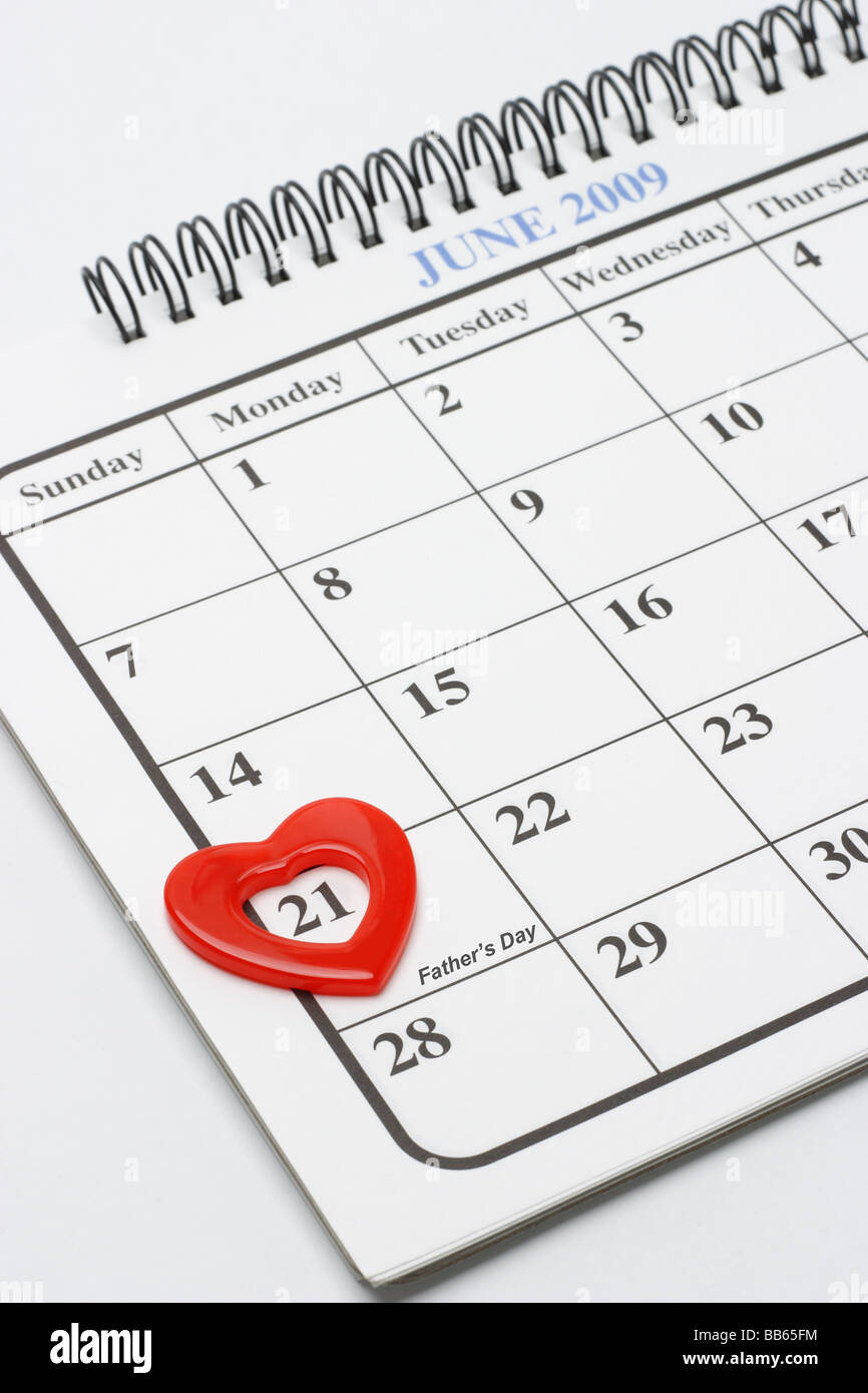 Heart shape symbol calendar page showing date of Father s day Stock Photo