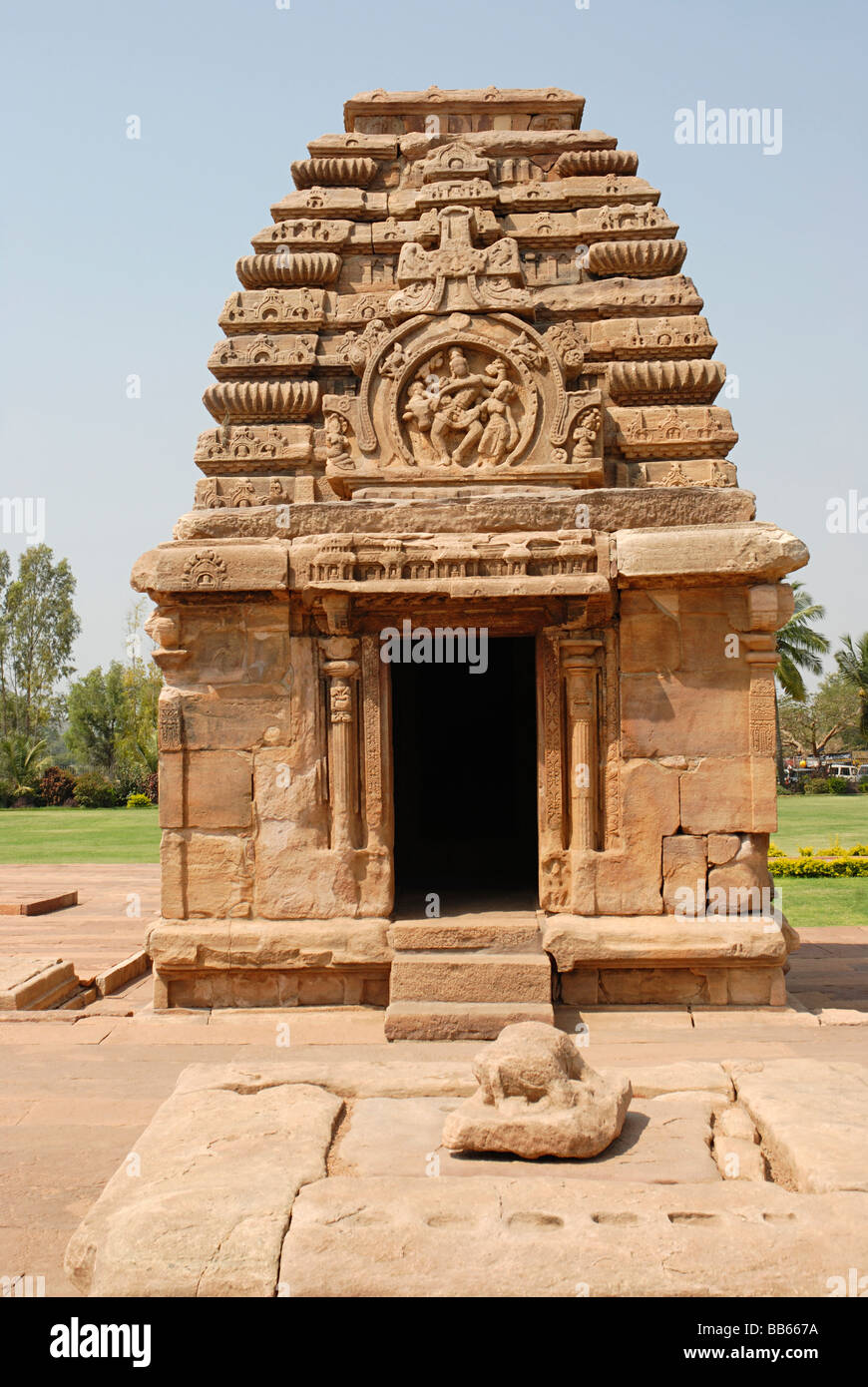 Pattadkal - Karnataka, Ganbulinga temple from East, showing Shiva - Parvati & Nandi in shukanasika above doorway. Stock Photo