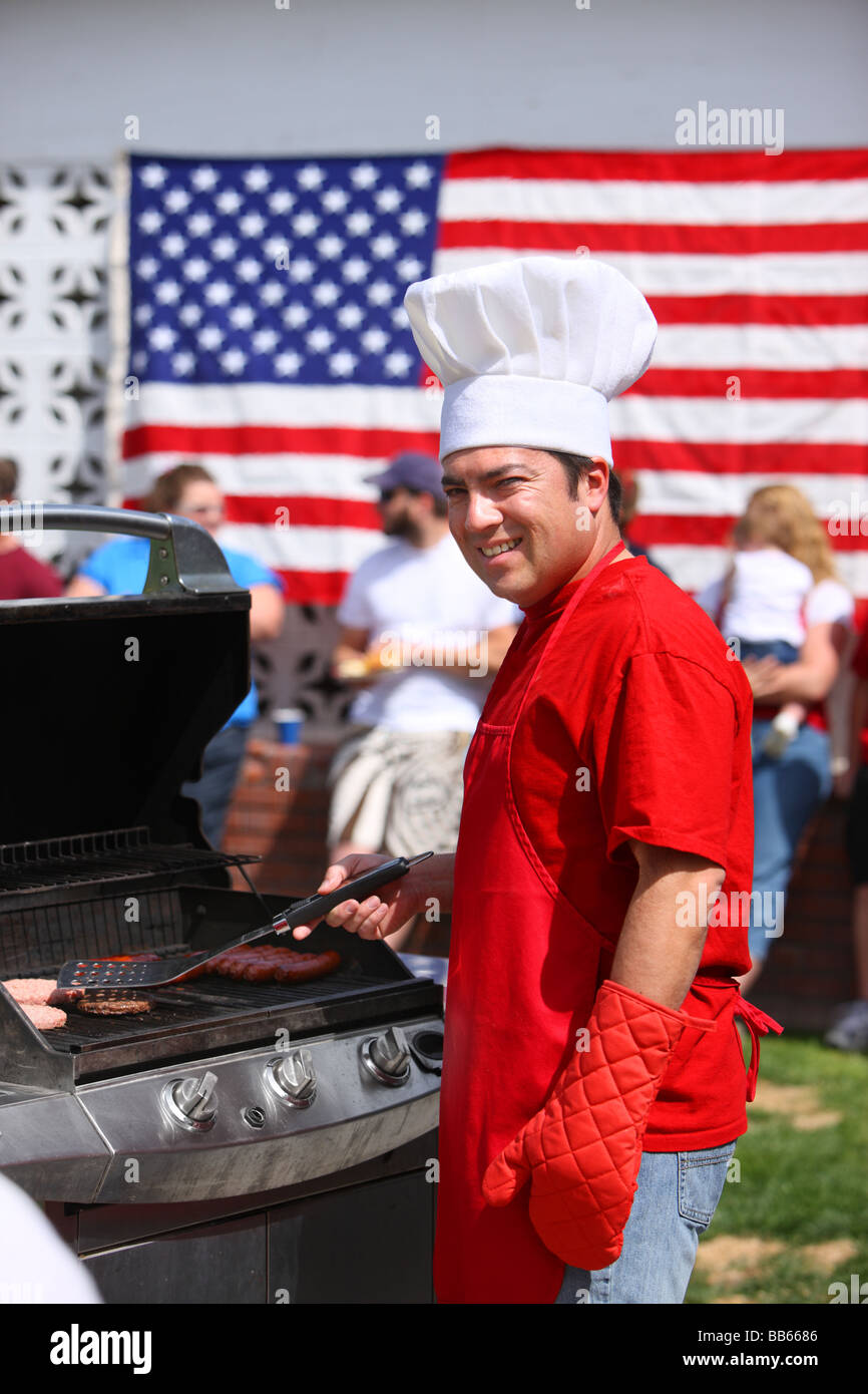 Man cooking at 4th of July Barbecue Stock Photo
