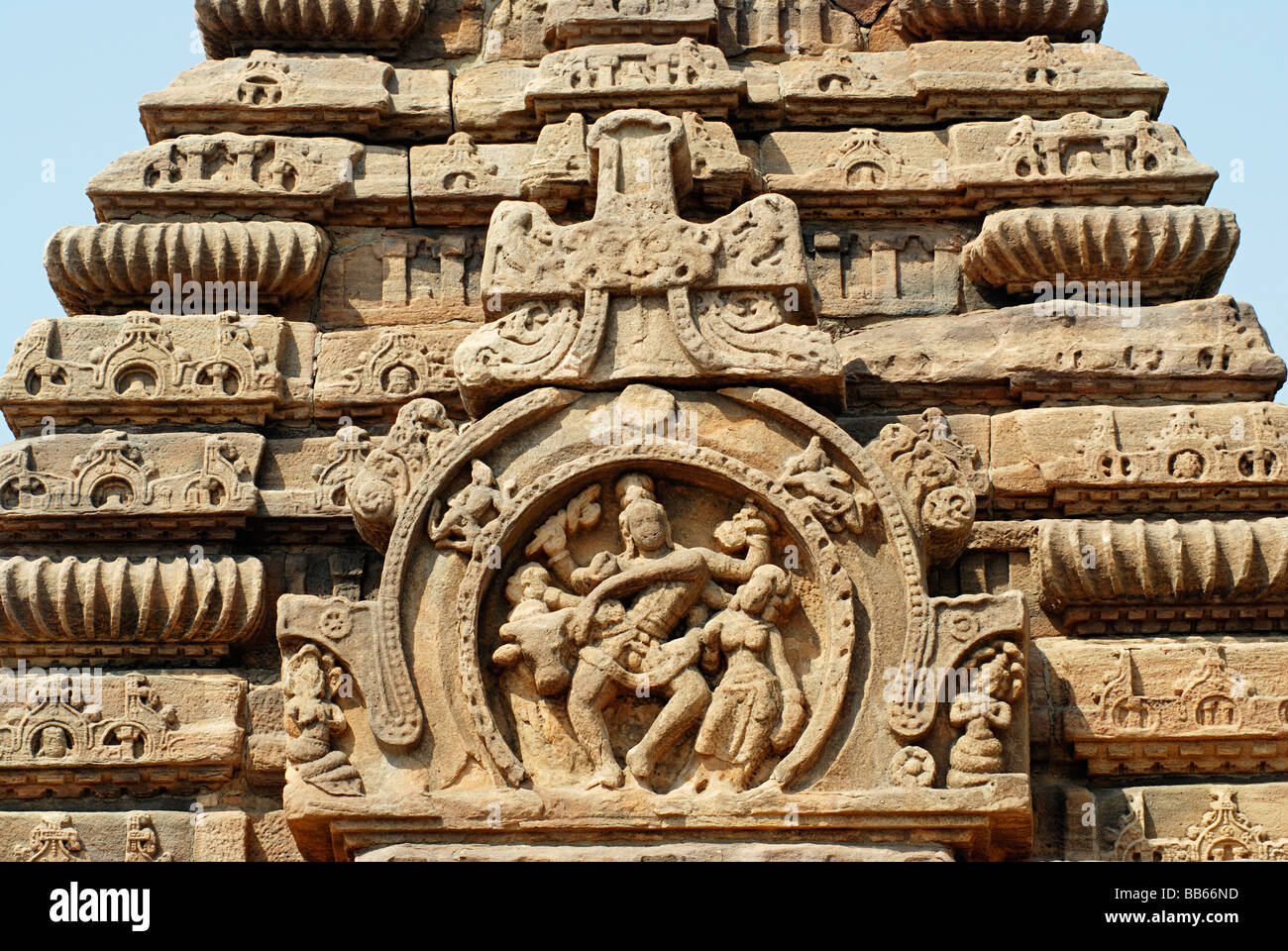 Pattadkal - Karnataka, Ganbulinga temple from East, showing Shiva - Parvati & Nandi in shukanasika above doorway. Closer view. Stock Photo