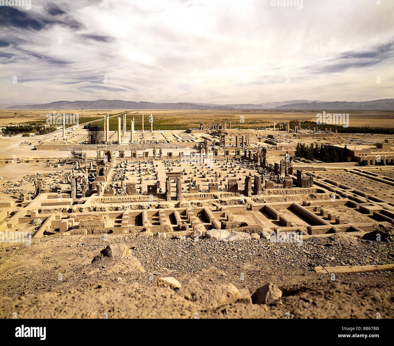 geography / travel, Iran, Persepolis (Parsa), built 518 BC, destroyed 330 BC, overview, audience hall (Apadana), behind: hall of the hundred columns, foundation by Dareios I., summer residence of Achaemenides, burned down by Macedonia, Alexander the Great, UNESCO, World Heritage Site, Persian empire, 100 column hall, ruins, ancient, antiquity, historic, historical, ancient world, Stock Photo