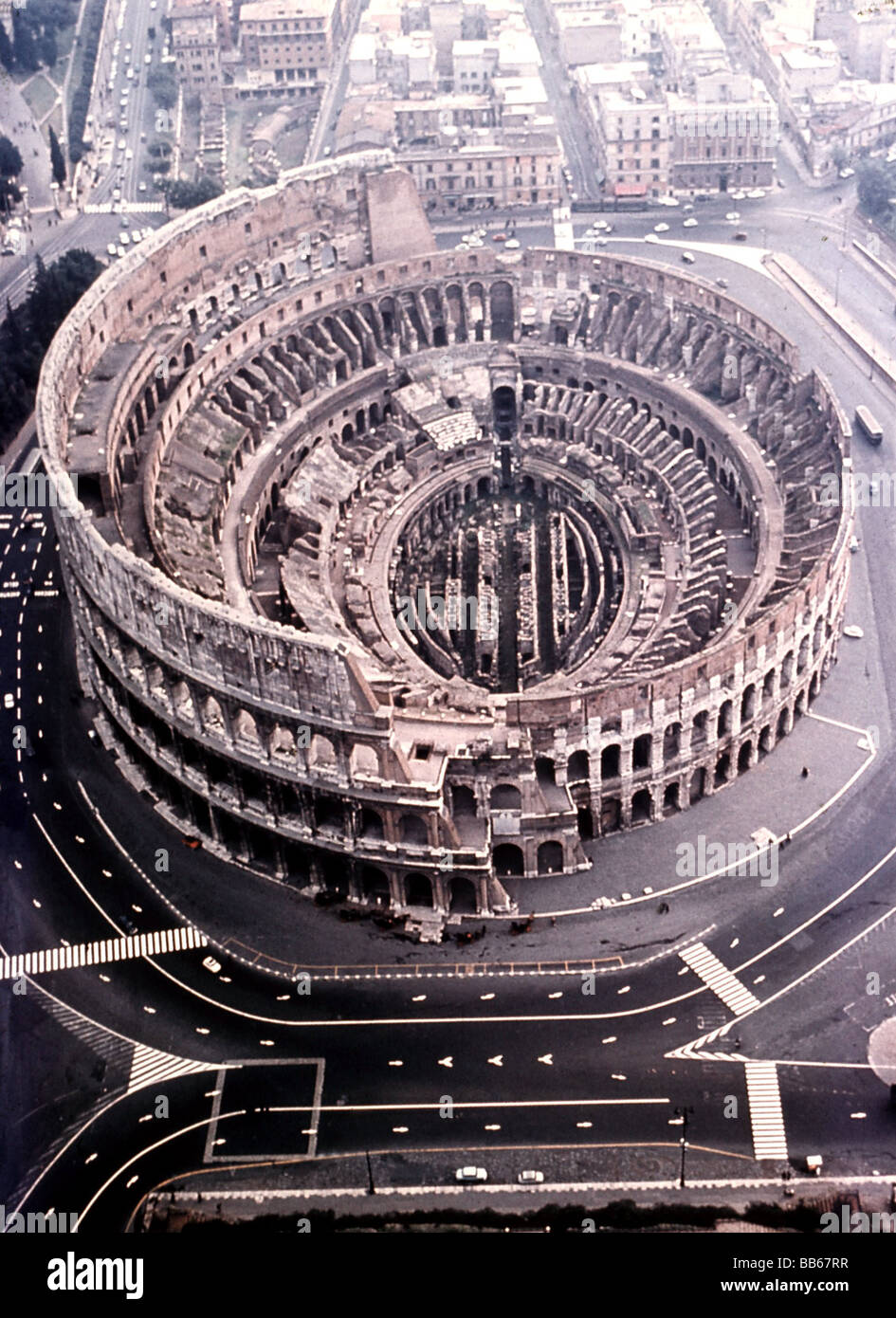 geography / travel, Italy, cities, Rome, Kolosseum (Amphitheatrum Flavium), inaugurated in 79 AD by emperor Vespasian, aerial view, gladiator fights took place there, (Munera), Colosseum, Coliseo, Colosseo, amphitheatre, arena, antiquity, Roman empire, towns, , Stock Photo