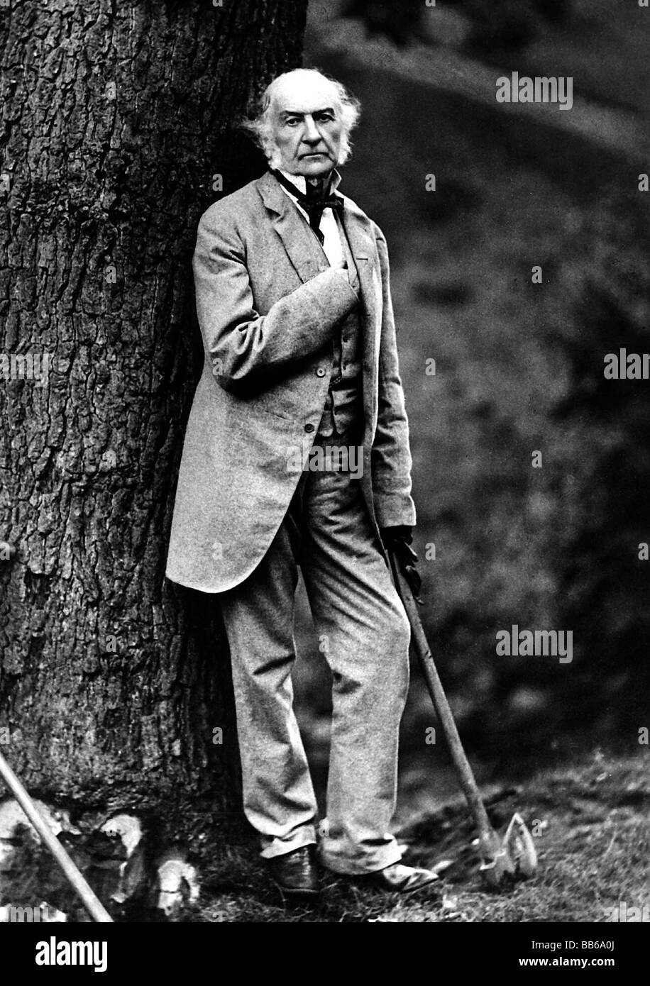 Gladstone, William Eward, 29.12.1809 - 19.5.1898, British politician (Lib.), full length, leaning at a tree, photograph by Elliot and Fry, 1880,  , Stock Photo