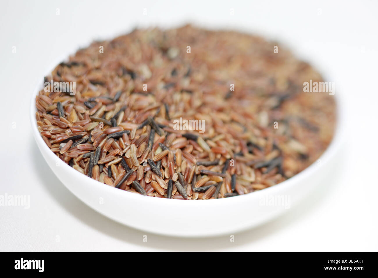 Bowl of Brown Rice Stock Photo - Alamy
