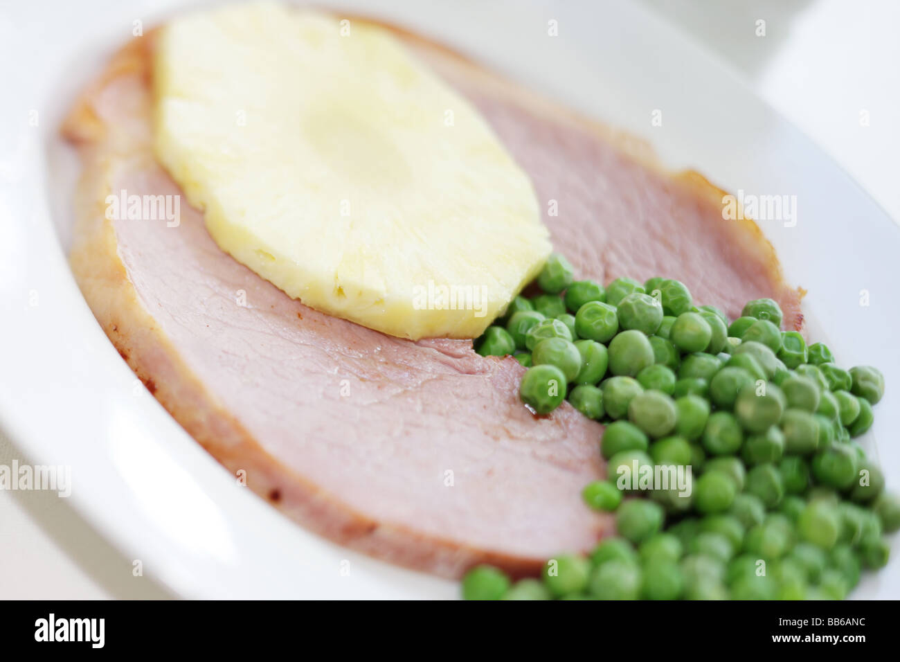 Smoked Gammon with Pineapple and Peas Stock Photo Alamy