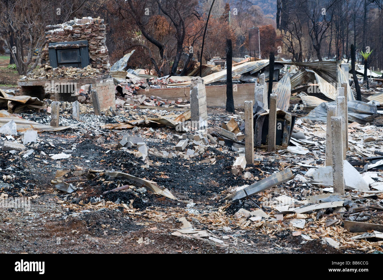 The remains of a home and devastation left after a bushfire Stock Photo ...