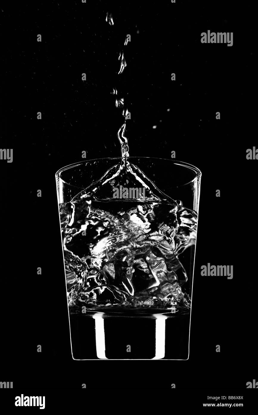Clear beverage splash Stock Photo Alamy