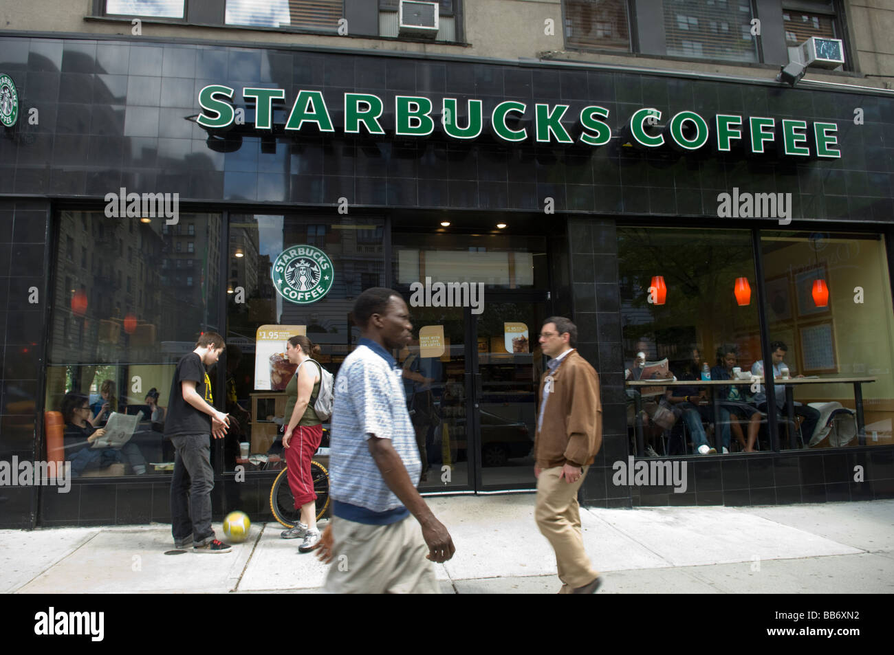 A Starbucks coffee shop on the Upper West Side of New York on Sunday May 10 2009 Frances M Roberts Stock Photo