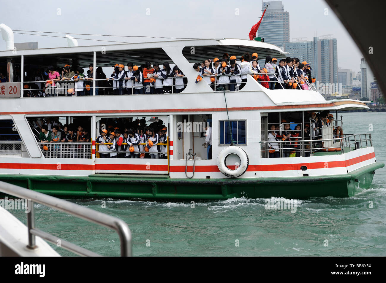 A ferry full of tourists in Xiamen Fujian China 17 Apr 2009 Stock Photo