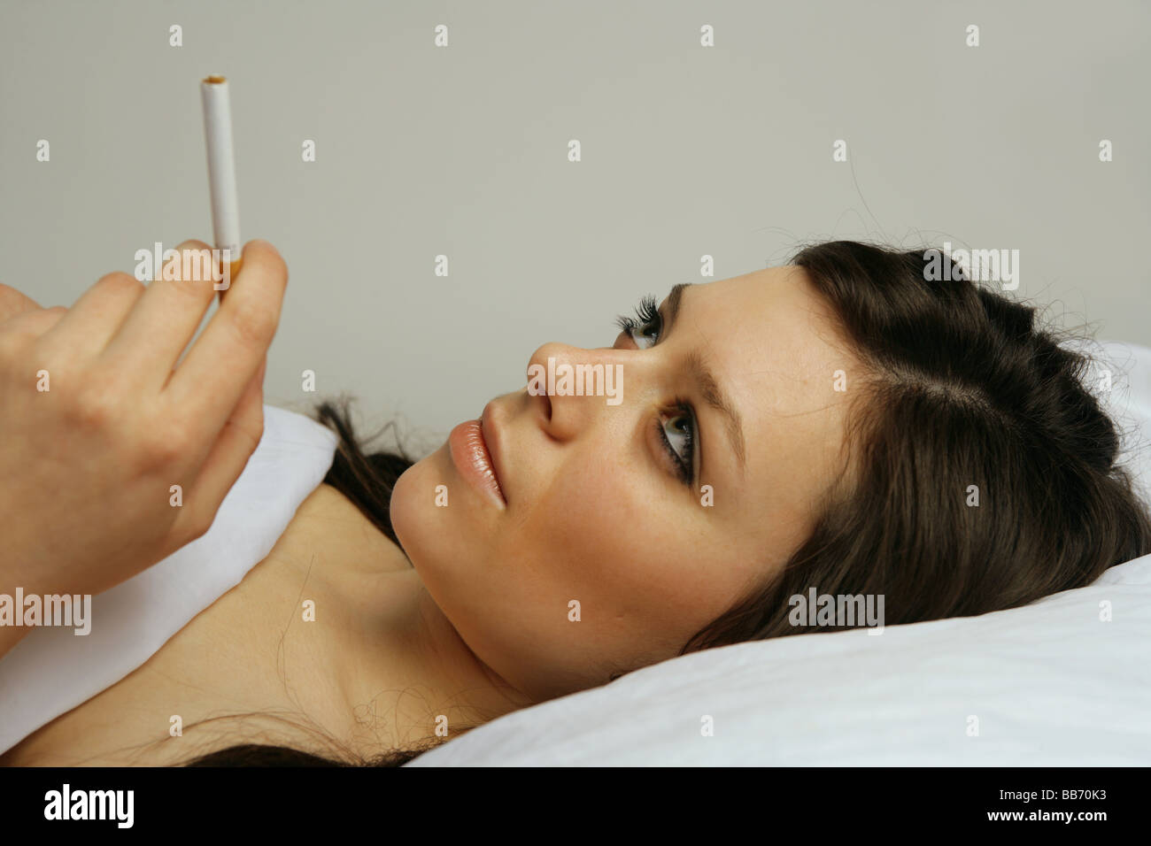 Smoking in the bed hi-res stock photography and images - Alamy