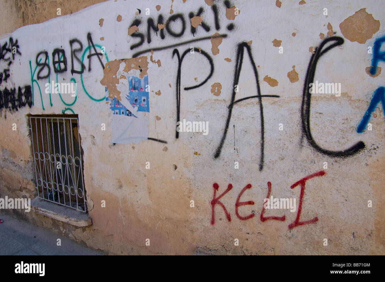 Urban graffiti on wall of building in city of Saranda Republic of Albania Stock Photo