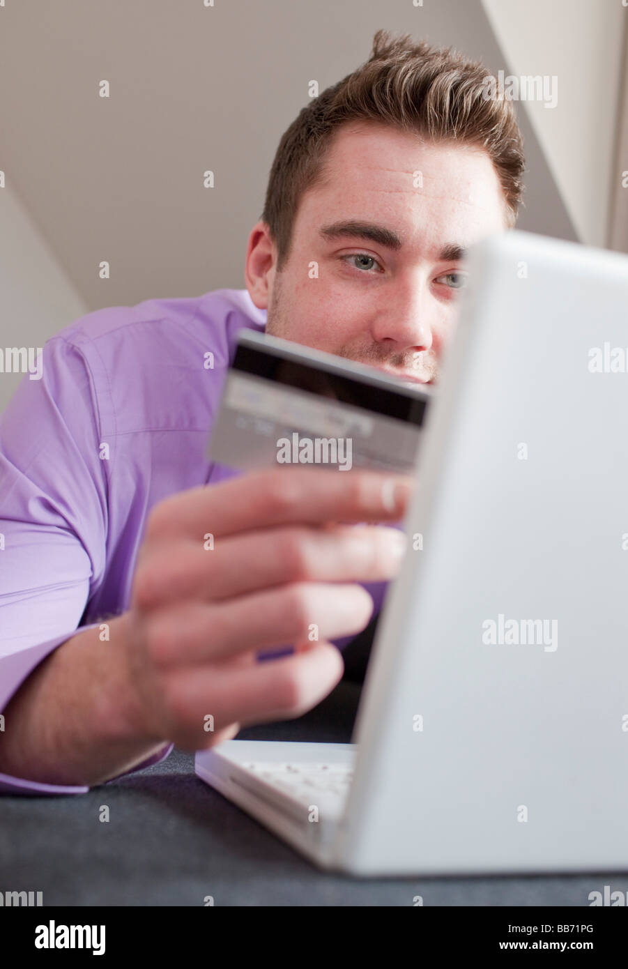Young man with laptop Stock Photo