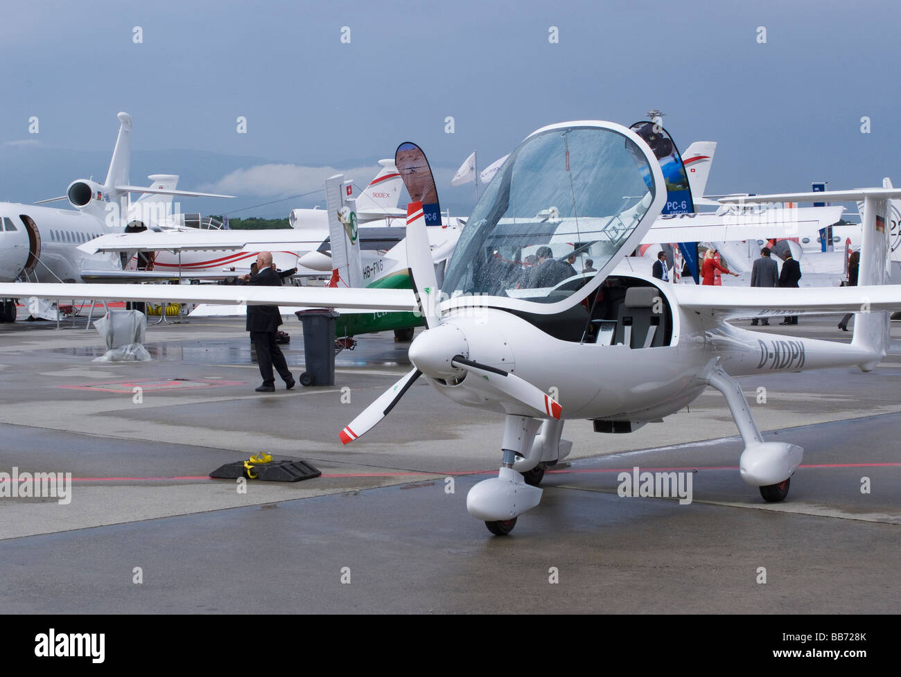 Motorised Glider and Corporate Business Jets at Ebace Trade Show Geneva Airport Switzerland Geneve Suisse Stock Photo