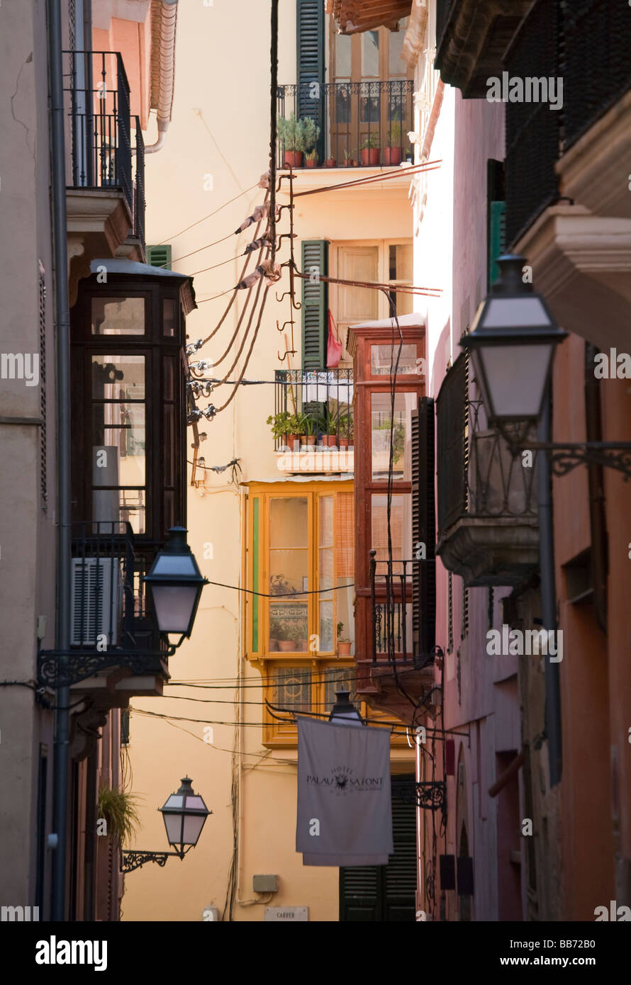 Narrow street with balconies Palma Mallorca Spain Stock Photo