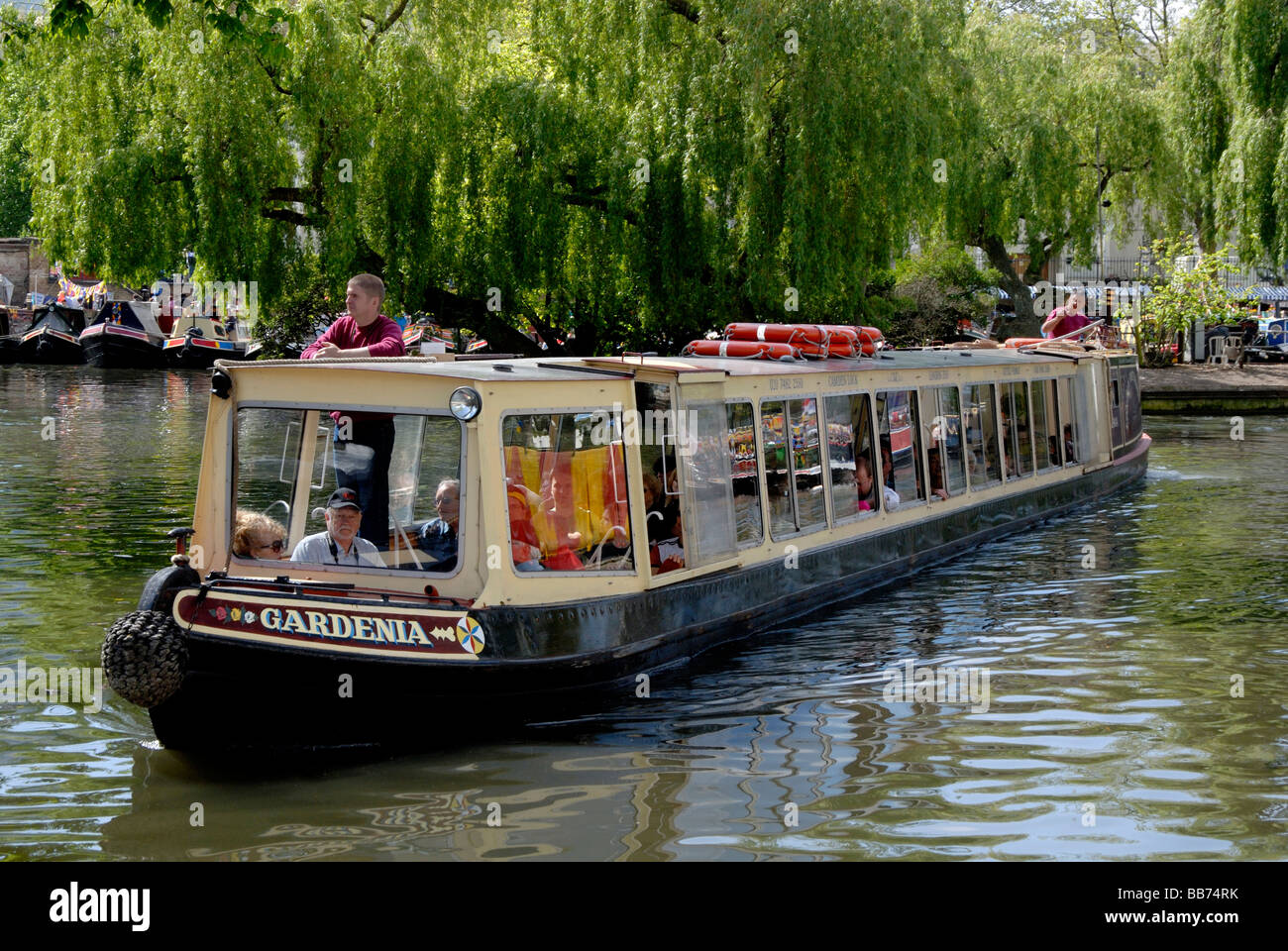 Tour boat: Narrowboat with tourists at Little Venice, London, England Stock Photo