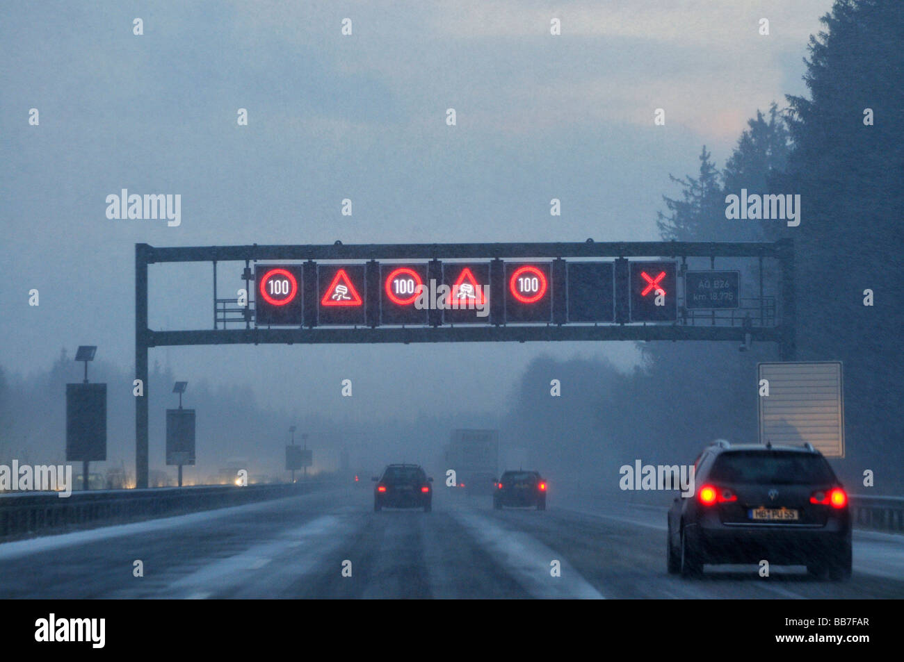 Busy motorway in driving snow, Bavaria, Germany, Europe Stock Photo